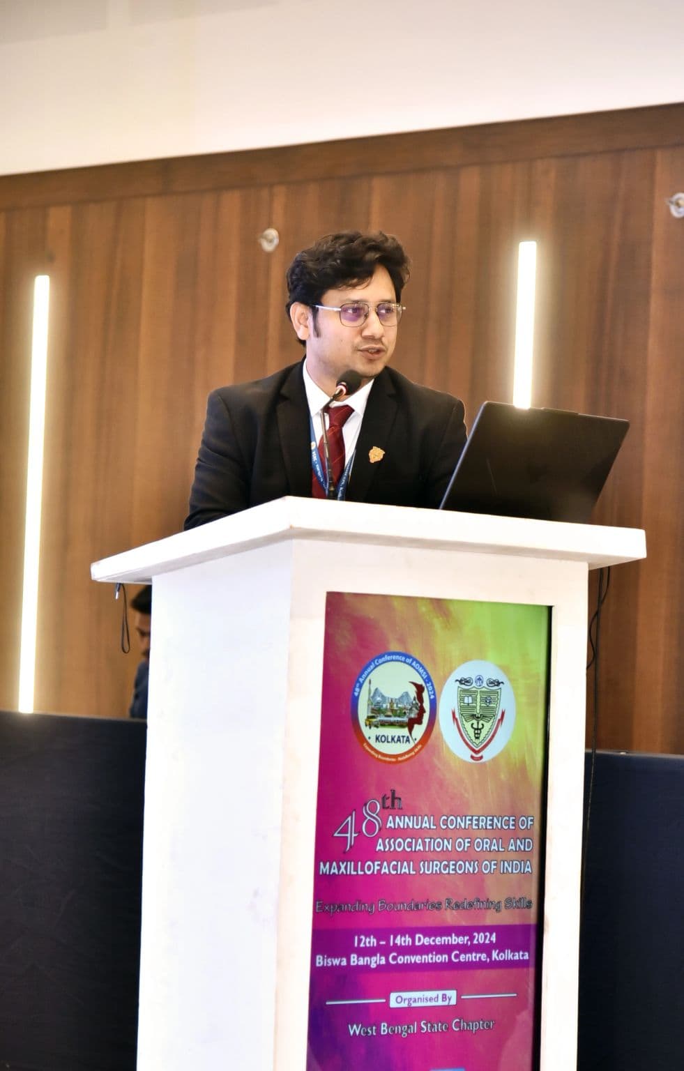 Dr. Alangkar Saha speaking at the 48th annual conference of the Association of Oral and Maxillofacial Surgeons of India in Kolkata
